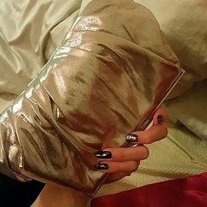 Brand new silver foil clutch